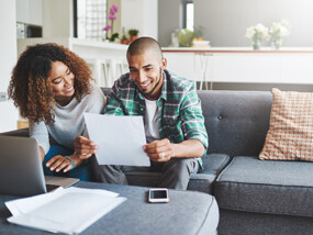 Couple at computer doing taxes