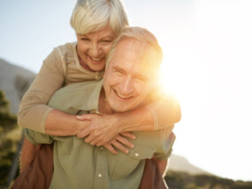 Cropped shot of a senior man giving his wife a piggyback