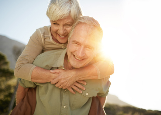 Cropped shot of a senior man giving his wife a piggyback