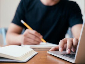 Student studying at laptop