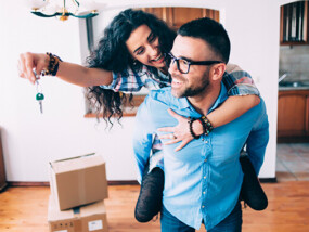 Young couple moving into new home