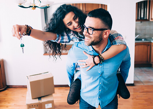 Young couple moving into new home