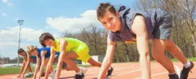 Young men getting ready to race