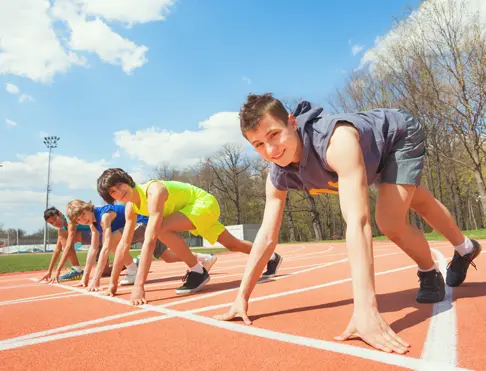 Young men getting ready to race