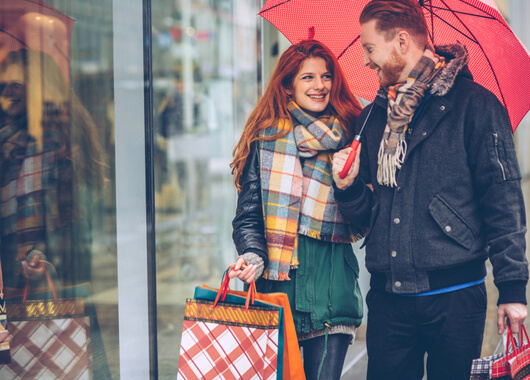 Young couple shopping on Black Friday.