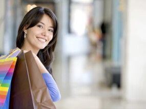 Woman holding bags in a shopping mall