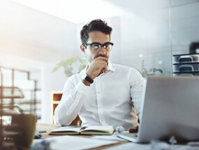 Businessman working on a laptop.