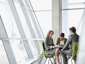 Business people looking at documents