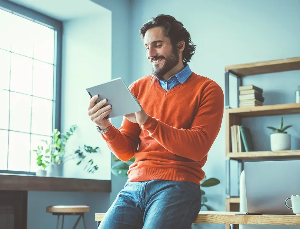 Man browsing tablet