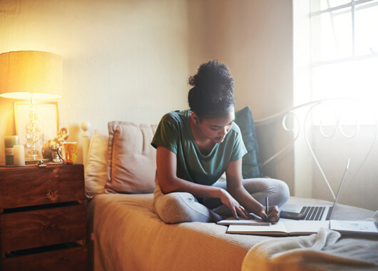 college student studying in dorm