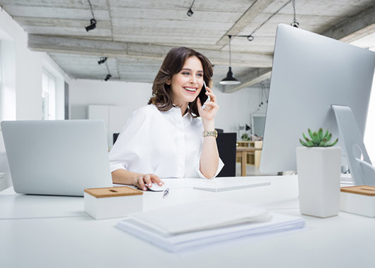 Corporate woman on the phone.