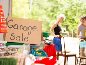 Garage full of items ready to be sold at garage sale.