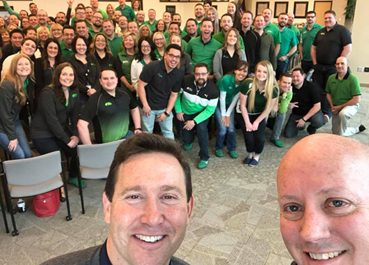 Picture of Jon Gordon with Idaho Central Credit Union Team members.