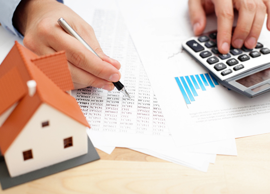 Closeup of man counting payments for home