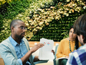 Young business professionals meeting outside