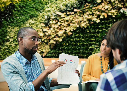 Young business professionals meeting outside