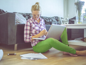 Woman paying bills online