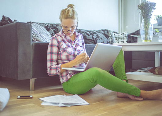 Woman paying bills online