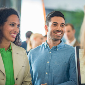 Couple talking to credit union teller