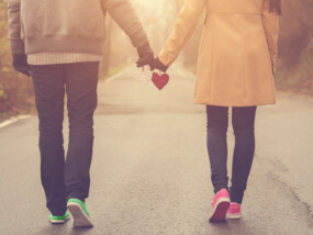 couple in love holding hearts