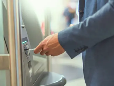 Man using an ATM