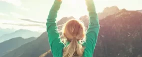 Women looking at mountains