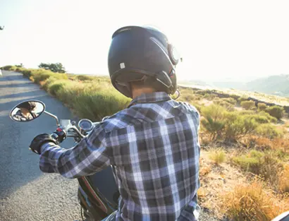 Man sitting on motorcycle