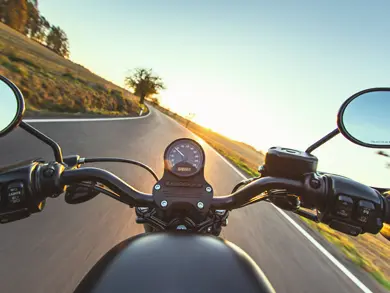 Motorcycle driving down the road