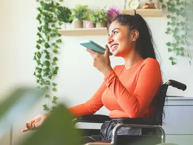 Women in a wheelchair talking on the phone