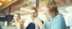 Women talking at a business meeting