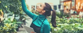 Women checking plants at work