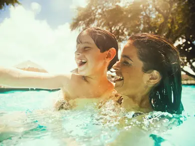 Mom and son swimming