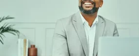 A business man smiling