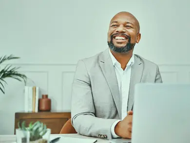 A business man smiling