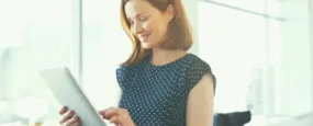 women browsing her tablet