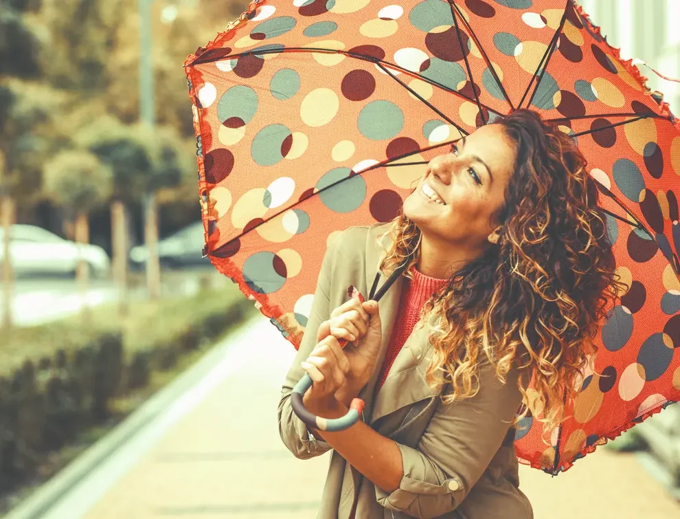 Women holding an umbrella