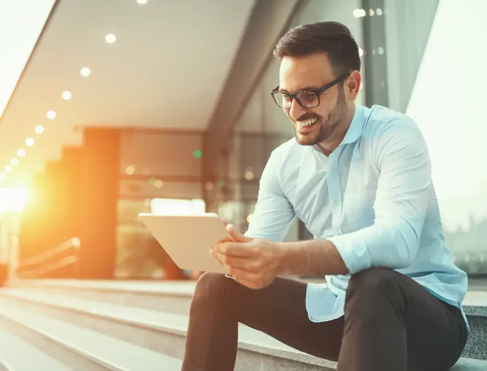 Man browsing tablet