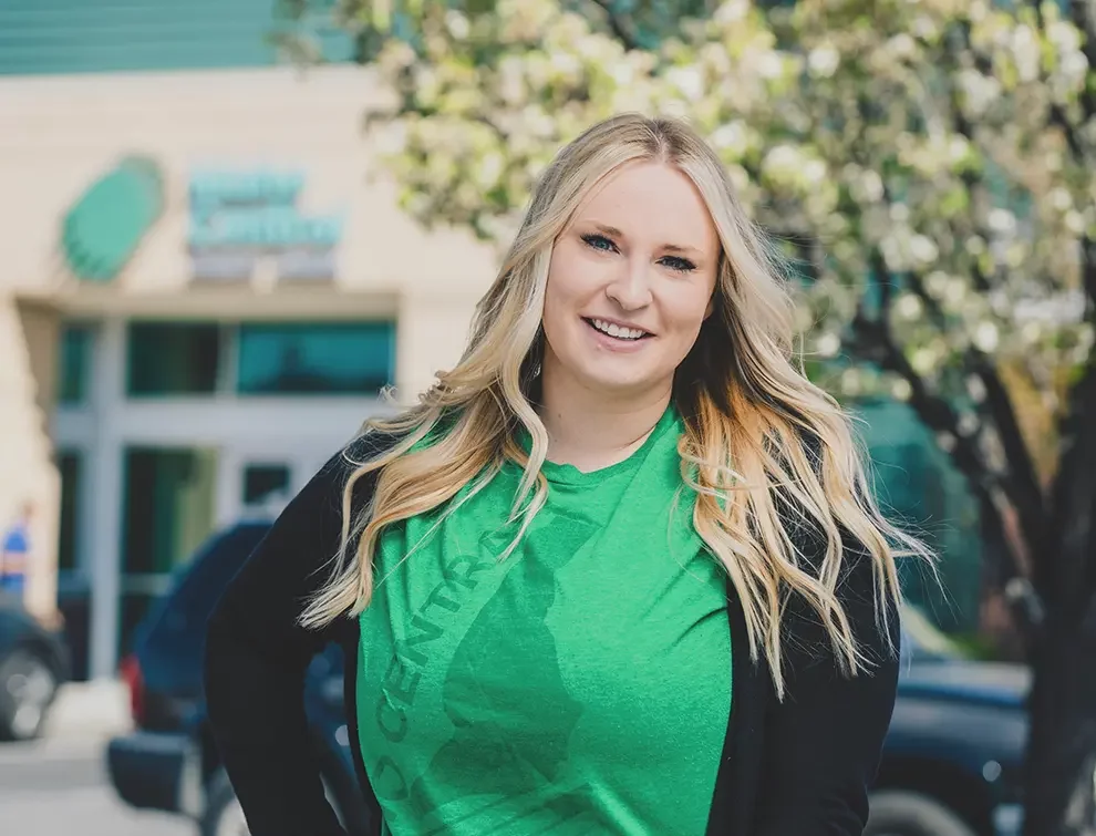 ICCU employee smiling outside