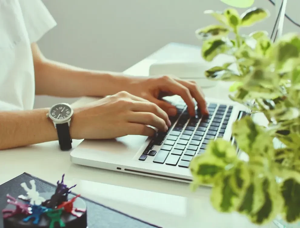 person typing on a computer