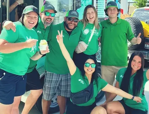 ICCU employees smiling at a parade