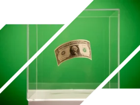 dollar bill floating in a clear safe