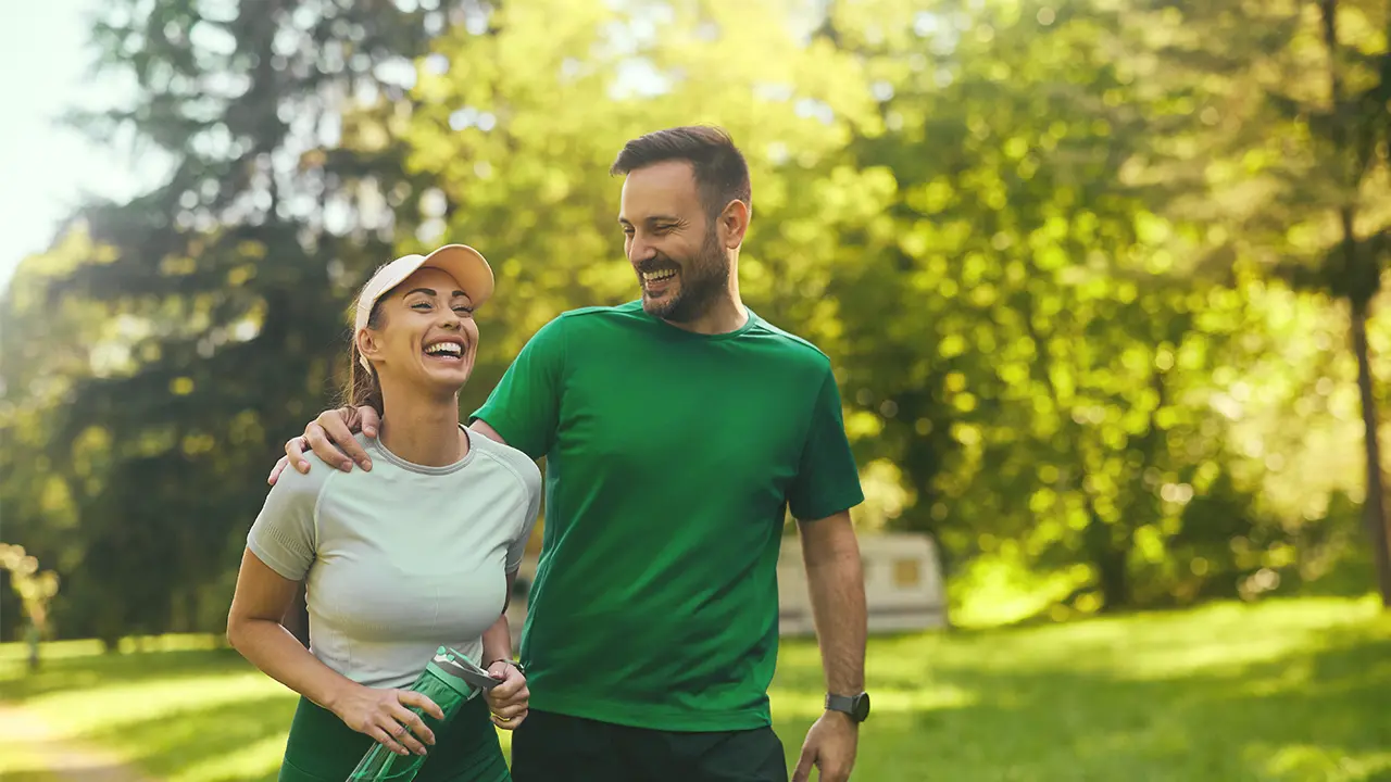 couple taking a spring walk in their neighborhood