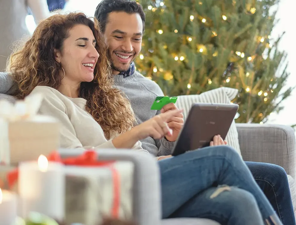 Two people shopping during the holiday season